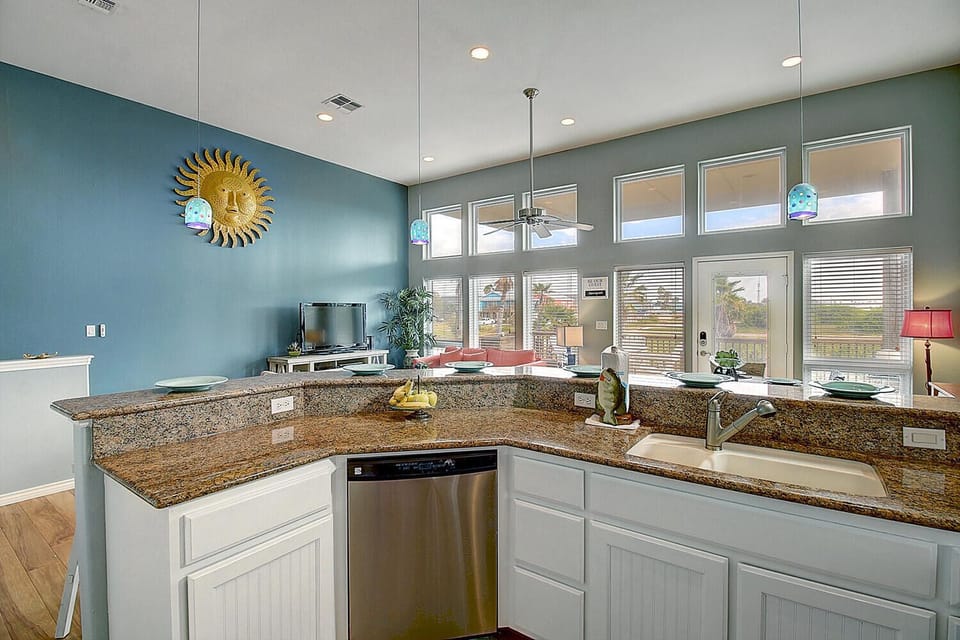 Kitchen - Generous countertops and abundant storage make meal prep and organization a breeze