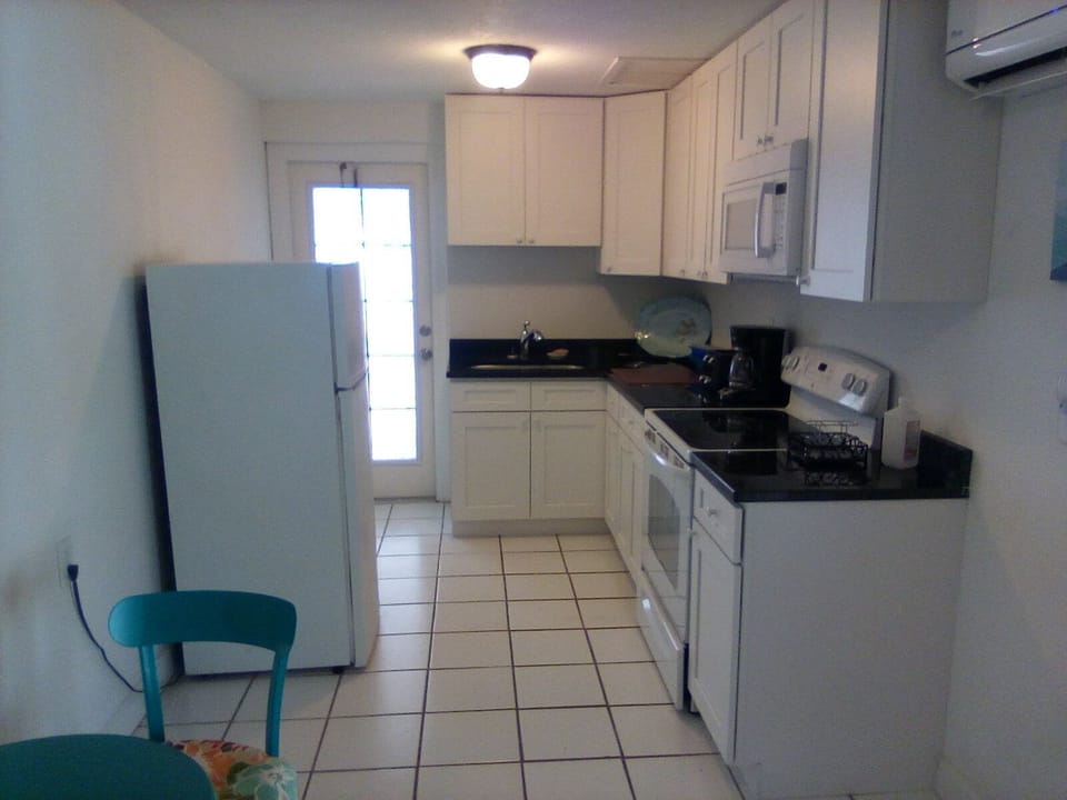 kitchen door leads to pool patio