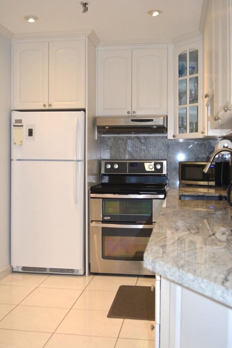 Kitchen is fully equipped; pots, pans, plates, utensils to cook
