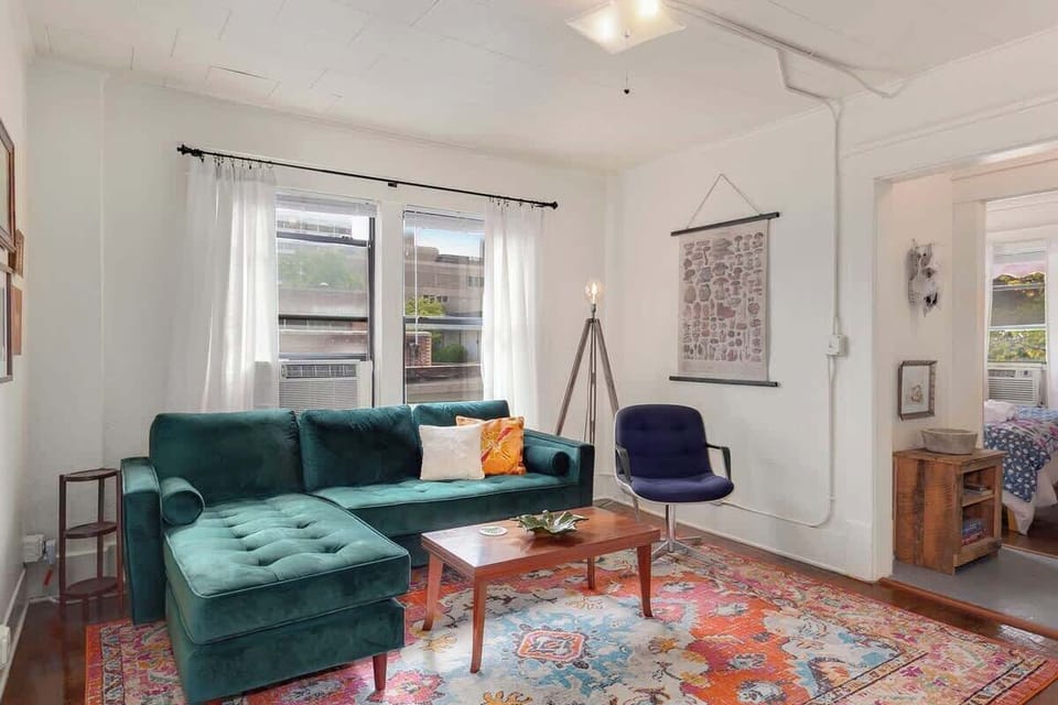 The Wildflower is colorfully decorated with a blend of new furnishings and vintage finds! With lots of windows that overlook downtown, this is the perfect place to experience the heart of Fayetteville.