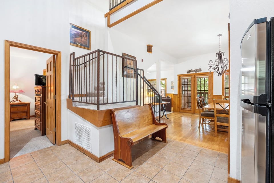 Open Floor Plan with Steps leading to 2 Upstairs Bedrooms