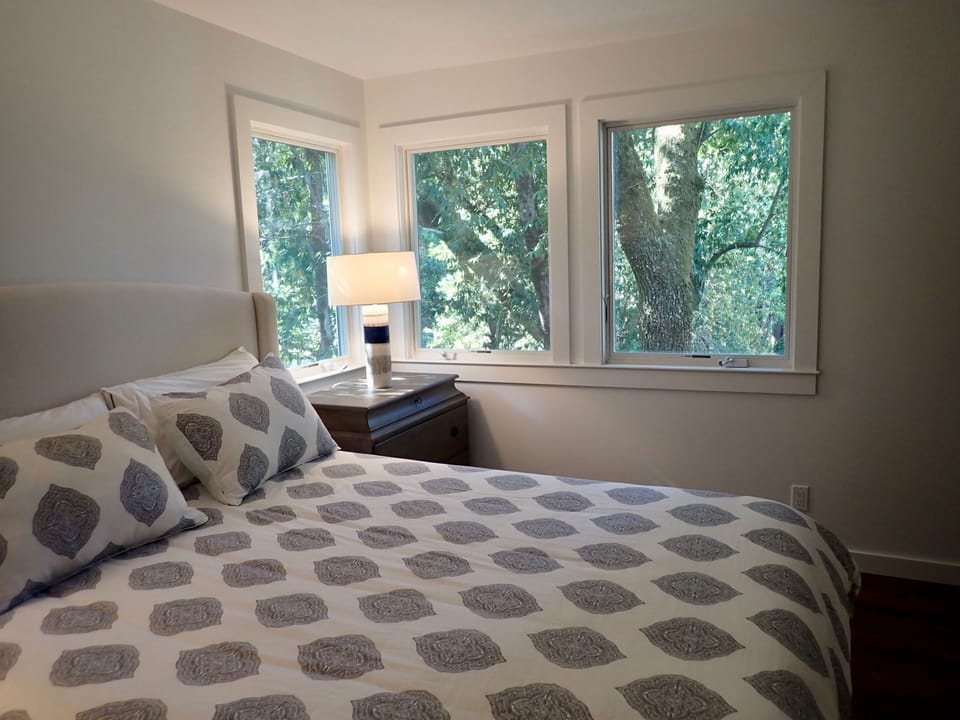 Master bedroom. Quiet, private, with views of shady woodland. 