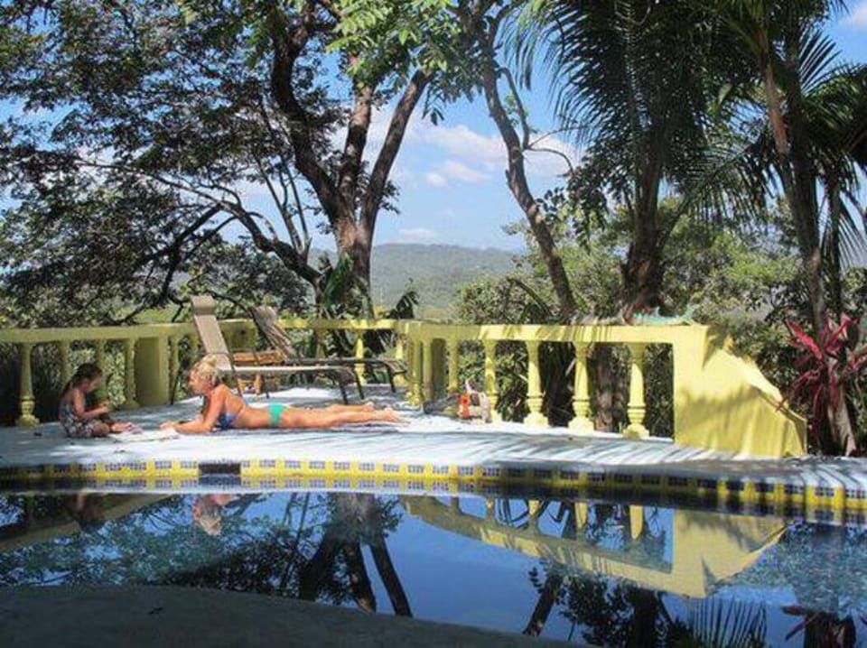 Relax by the pool and enjoy the warm sun