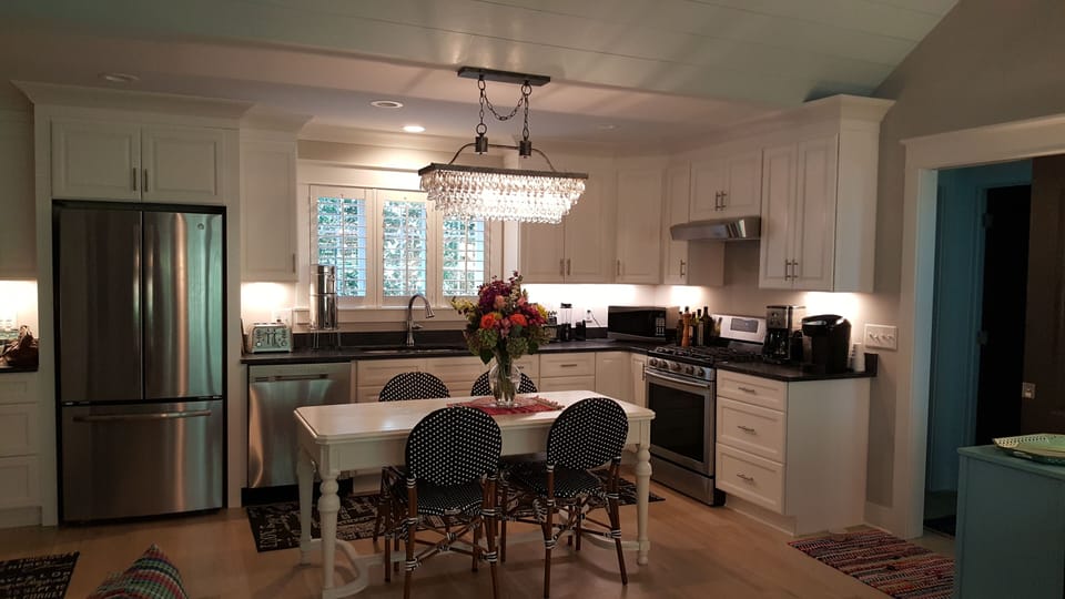 The coffee bar includes a Keurig, Nespresso, and Cuisinart.