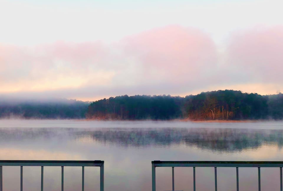 On dock watching sunrise