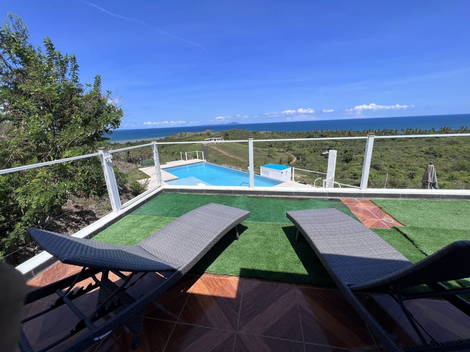 Amazing balcony overlooking the pool and Caribbean Ocean