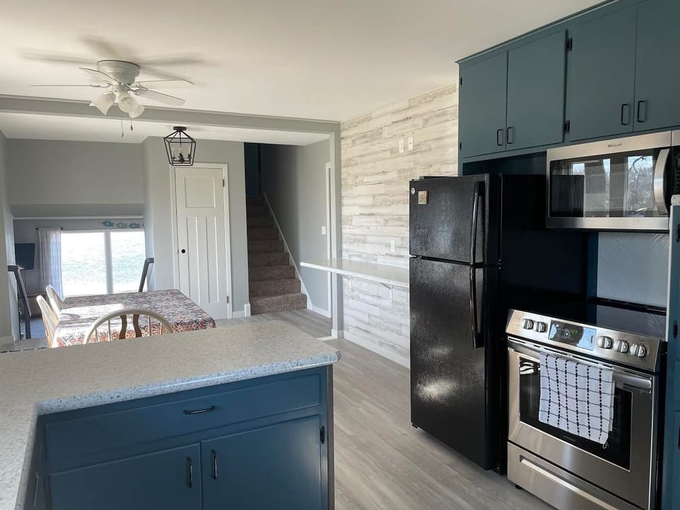 Updated kitchen - you can see the beach from the kitchen!
