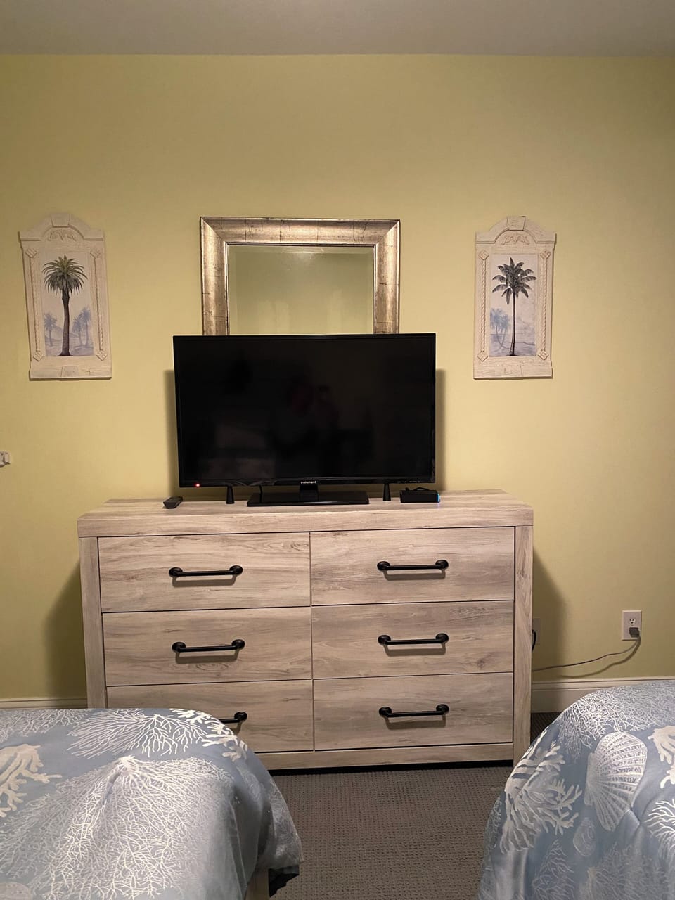 Twin Bedroom dresser with flat screen tv