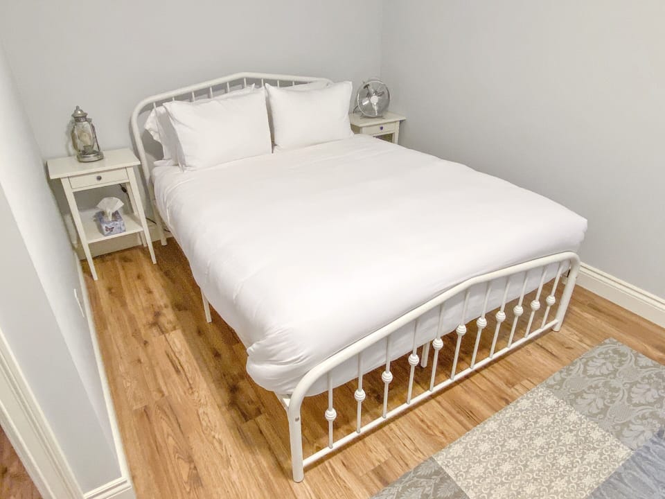 The lower level bedroom provides privacy from the rest of the cottage. 