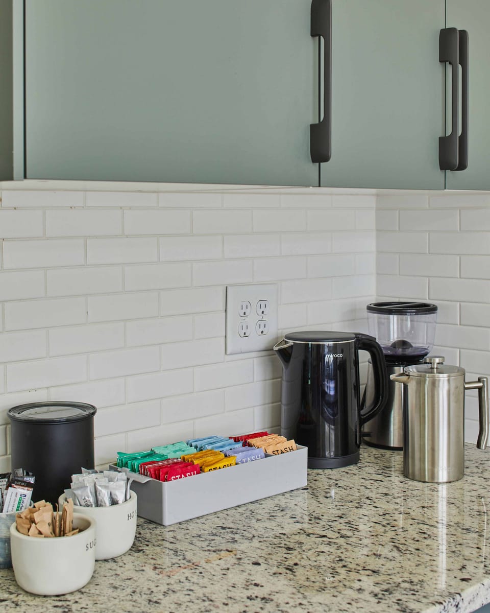 Help yourself to our complimentary selection of teas and locally-roasted coffee. We provide a burr grinder and a french press to help make a delicious cup of coffee.