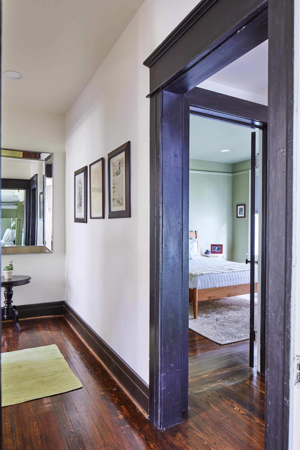 Step back into the hall to find the last two bedrooms neatly tucked away.