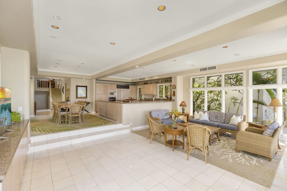 Lanai connects to both dining and living spaces for true indoor-outdoor living.
