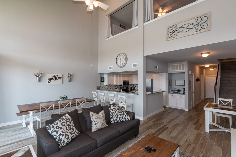 Beautiful living room/kitchen with loft upstairs