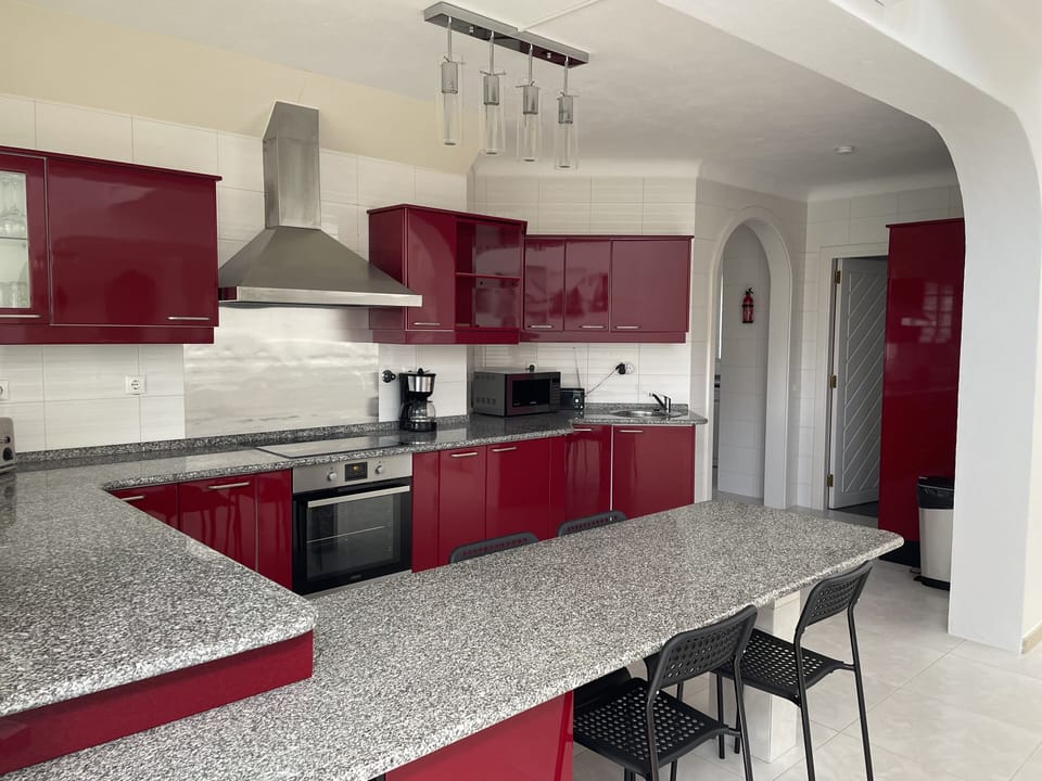 Fully equipped kitchen with utility room