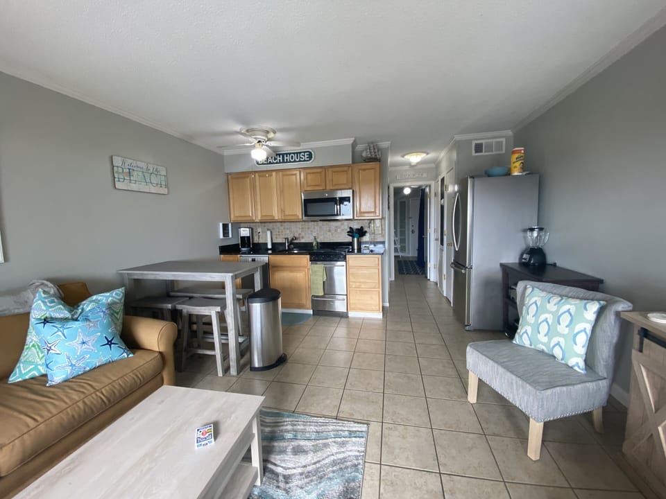 Spacious living area with plenty of comfortable seating. 