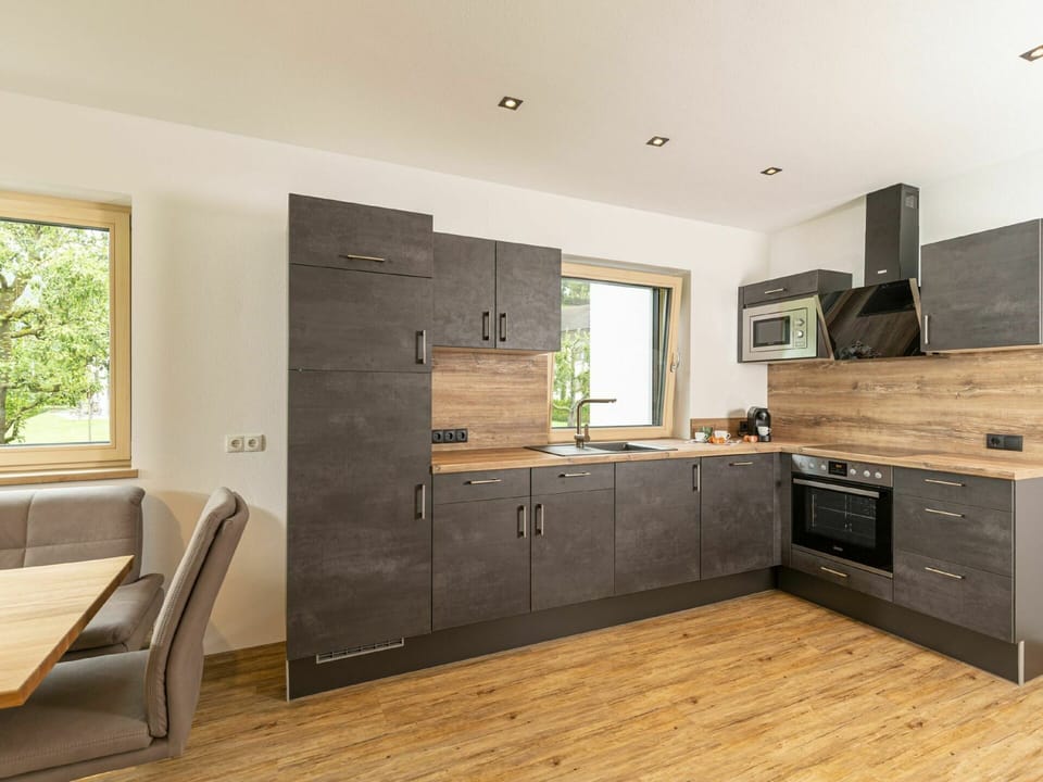 Cabinetry, Countertop, Property, Furniture, Drawer, Kitchen Stove, Wood, Lighting, Building, Window