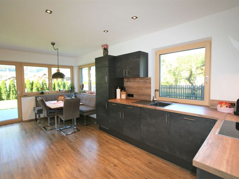 Property, Table, Countertop, Window, Plant, Building, Cabinetry, Interior Design, Wood, Houseplant