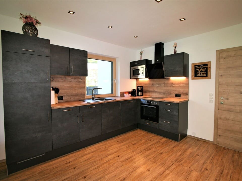 Brown, Cabinetry, Countertop, Property, Furniture, Drawer, Kitchen, Kitchen Stove, Interior Design, Kitchen Appliance