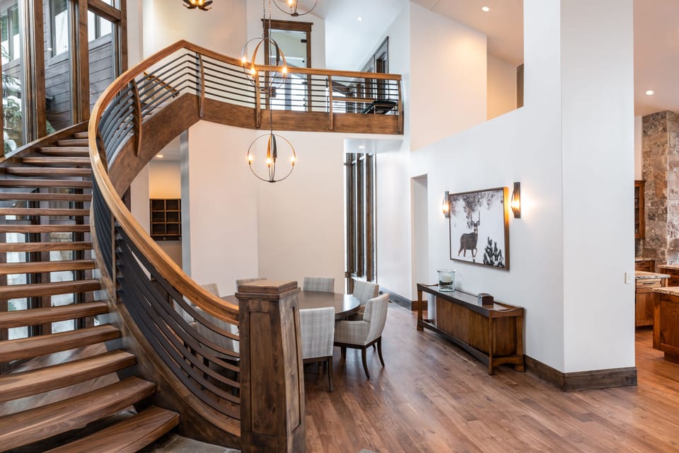 Stairs to private king bedroom with en suite bathroom