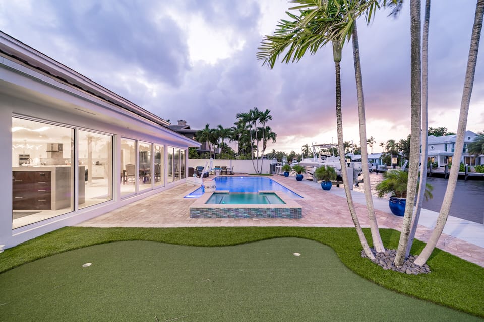 Waterfront pool, hot tub, & putting green.
