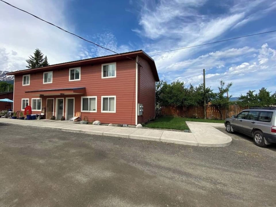 Apartment is last building on the right side of the road to the lake 