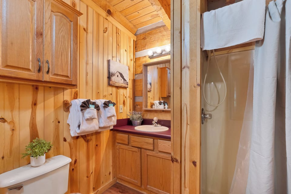 Full bathroom with a stand up shower right off of the master bedroom on the main level.