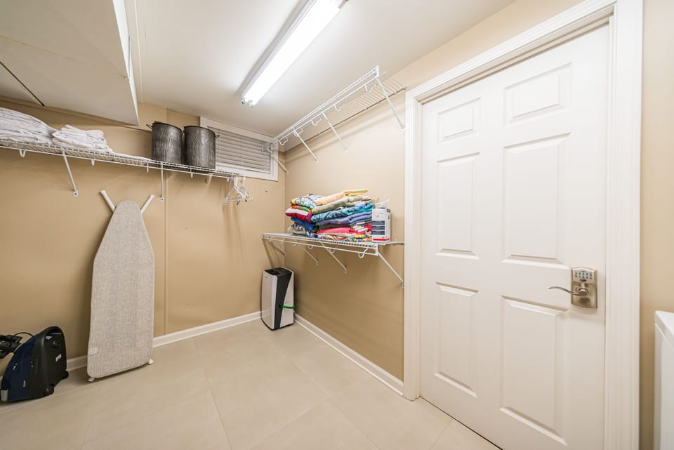 Ironing board and storage space