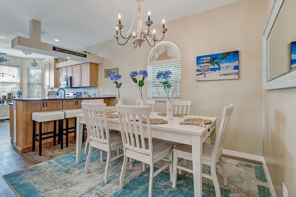 Open plan kitchen,  with breakfast bar, coffee station and dining area.