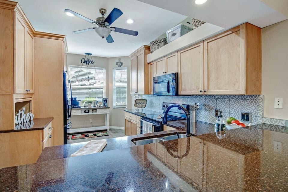 The kitchen is very well equipped with most small appliances you could need, plenty of tableware, silverware, etc. for all your dining needs.Stove, oven, microwave, dishwasher and a large refrigerator/freezer with a water and ice dispenser.