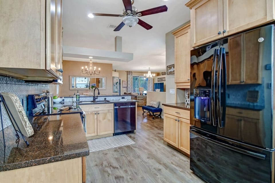The kitchen is very well equipped with most small appliances you could need, plenty of tableware, silverware, etc. for all your dining needs.Stove, oven, microwave, dishwasher and a large refrigerator/freezer with a water and ice dispenser.