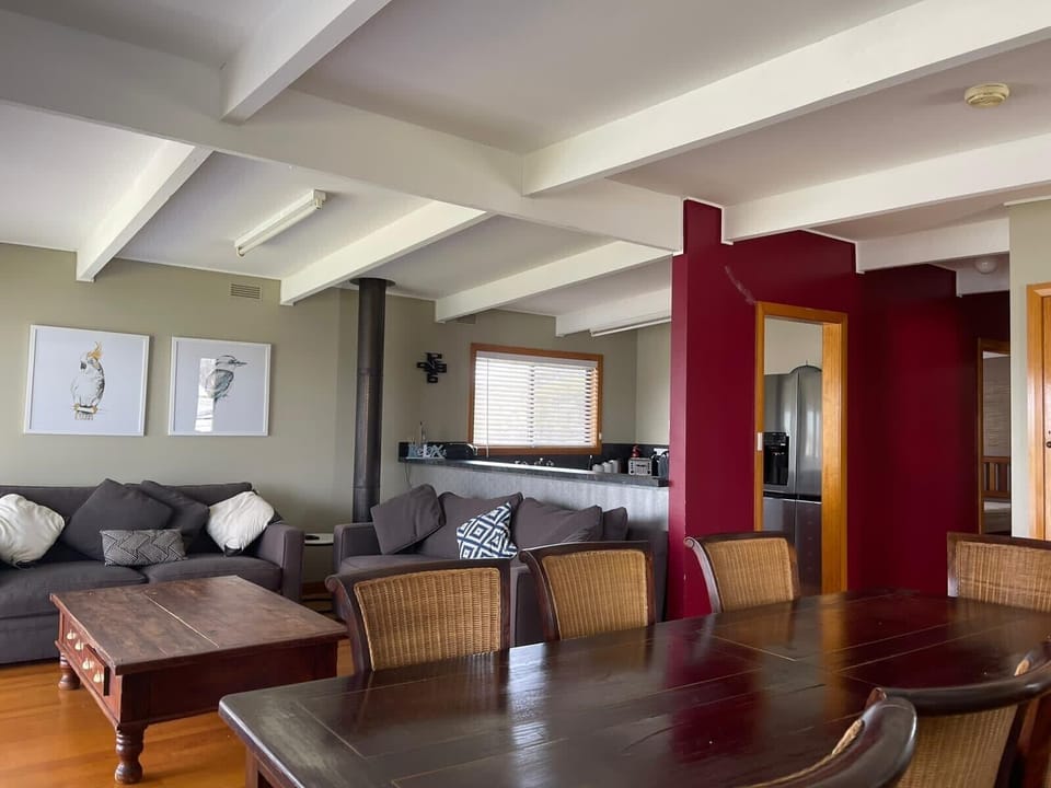 View to Kitchen and upstairs lounge from dining table