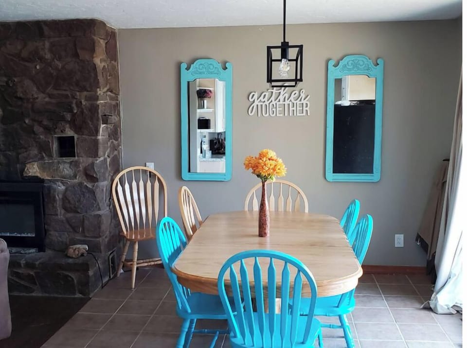 Main Level Dining Room with Scenic View and Slider to Spacious Deck