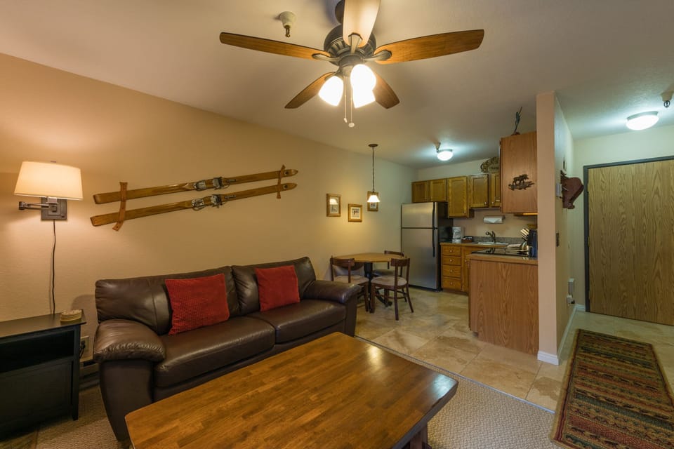 Living room with fireplace and a tv