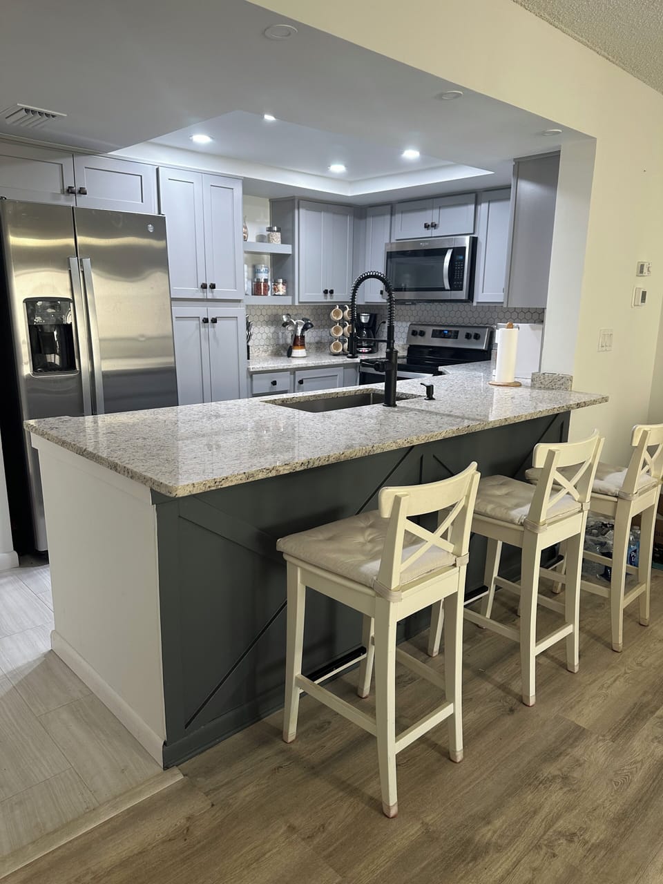 Open area kitchen with stools