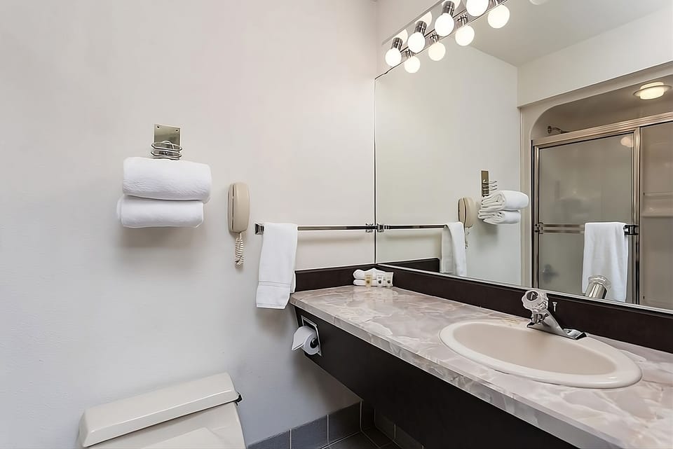 Refresh easily with a clean vanity and well-lit mirror