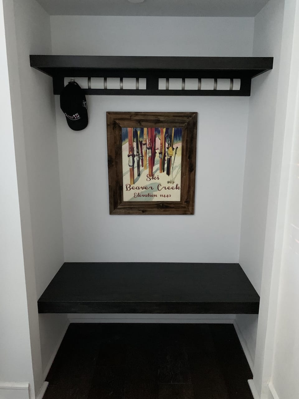 Bench by front door.