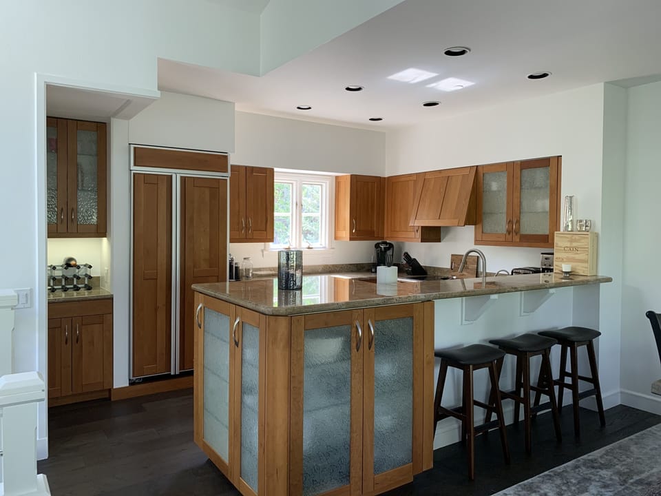 Sun-filled fully stocked kitchen.