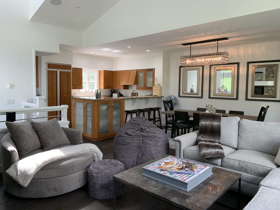 Open floor plan with kitchen, dining room, and living area.