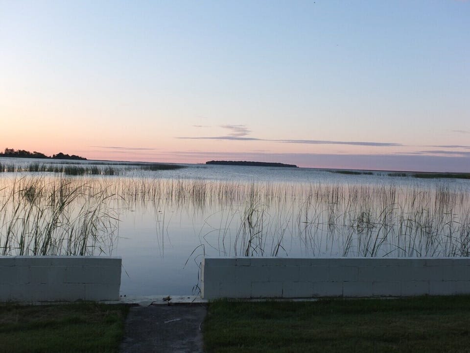 EXTERIOR:  Another view of Lake Huron in the morning, with Sulphur Island in the background.