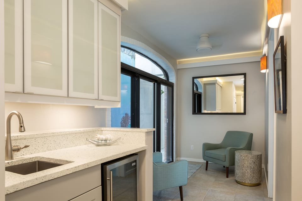 Lower level front entry with wet bar and ice maker