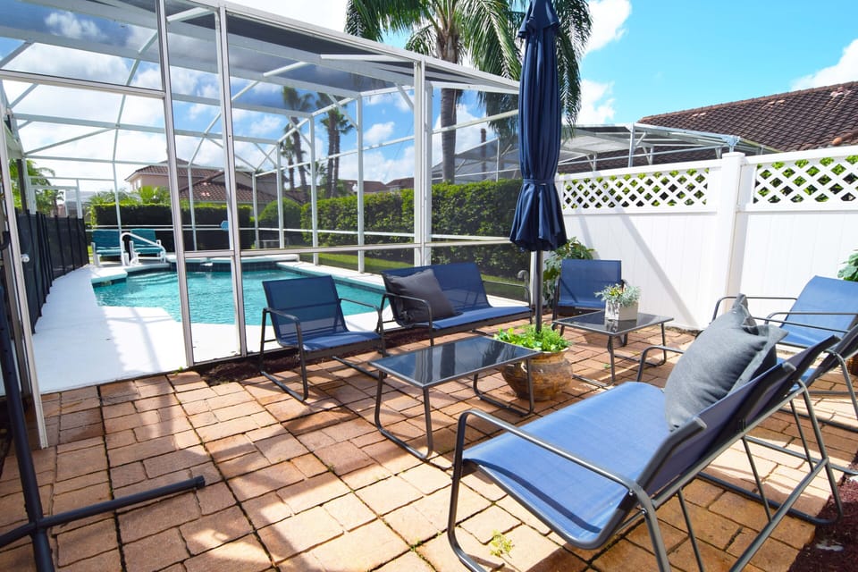 Outdoor courtyard lounge next to the private west-facing pool