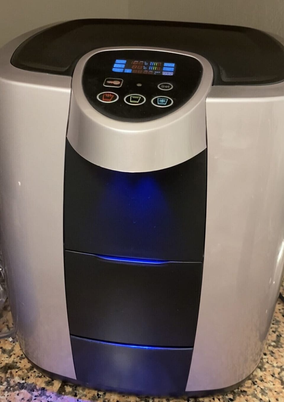 A water cooler with hot, room temperature and cold water is ready for your use.