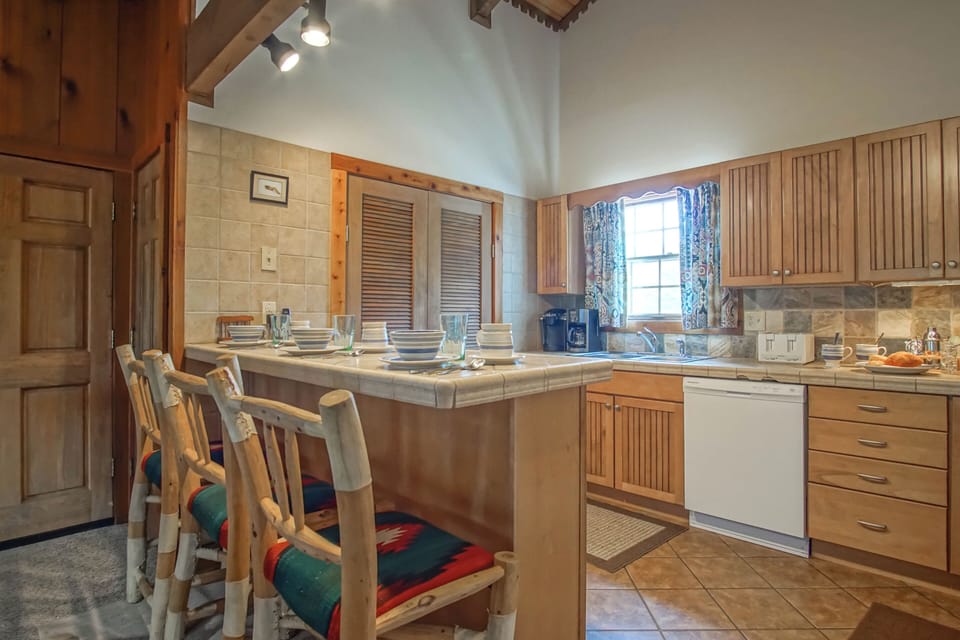 You can seat 3 at the kitchen bar.