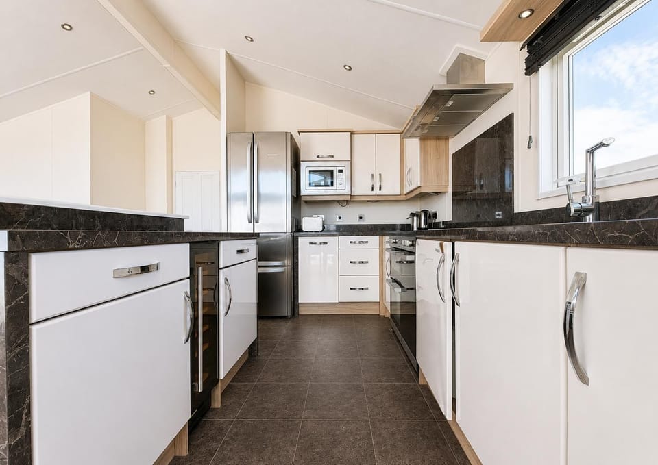 Bright, modern kitchen with ample counter space and natural light