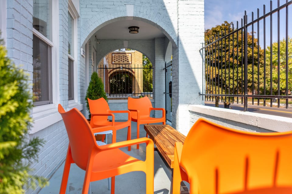Relax on the front porch. Plenty of seating. Sun on your face. Beverage in hand.
