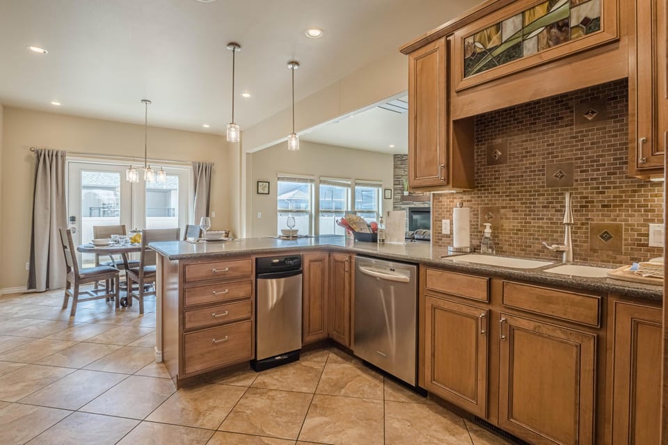 Modern and fully equipped kitchen with stainless steel appliances and all the essentials for a hassle-free stay