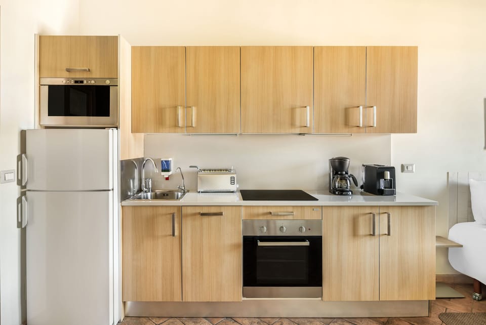 Cook authentic Italian meals in a bright kitchen equipped for easy, modern living.