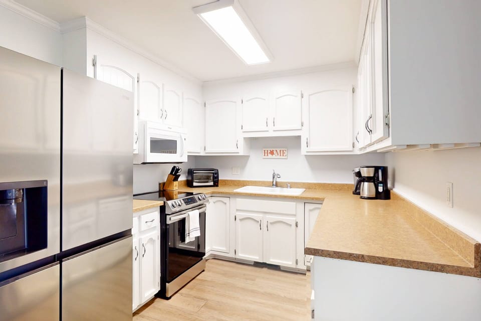 Enjoy using a new refrigerator and stove while staying at Sea Turtle's Nest!