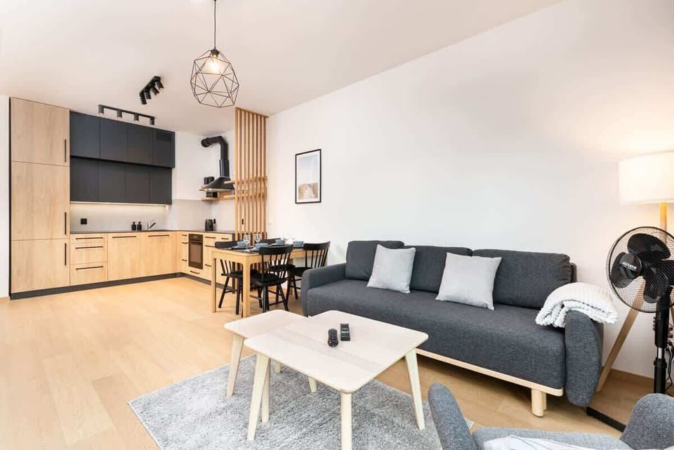 The living room's decor combines elegance with functionality. 