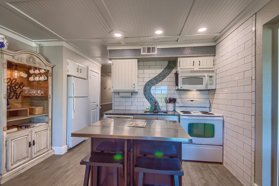 Adorable Kitchen with a Coffee Bar.
